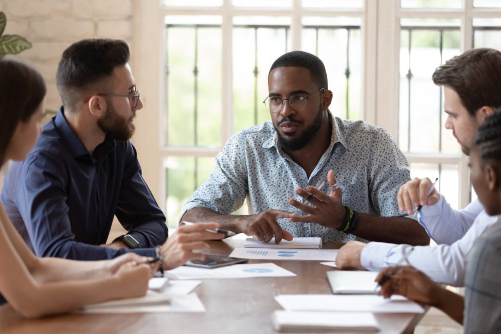 Diverse group of educators meeting