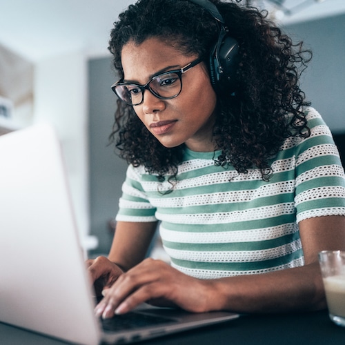 Black woman on computer